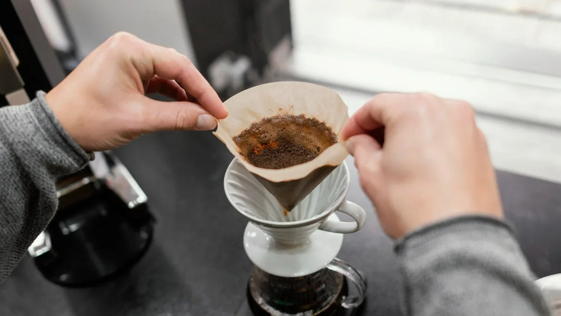 top view of man creating perfect pour over coffee